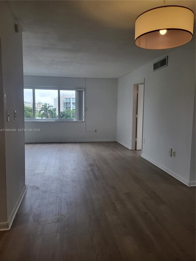 Building Photo - 1020 94th St Unit 503