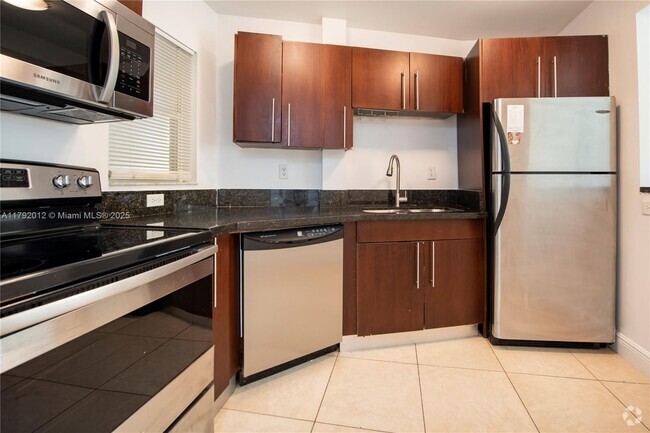 Building Photo - 4147 Stirling Rd Unit 205 Rental