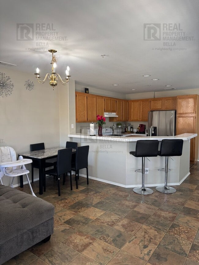 Photo - Charming End-Unit Condo with Modern Amenit...