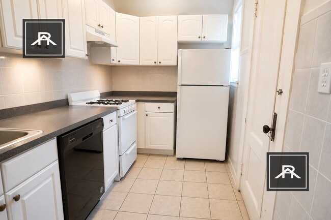 Building Photo - 316 St Paul St Unit 7