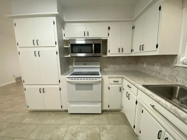 Photo - 3 bedroom 2 bath with extra storage!