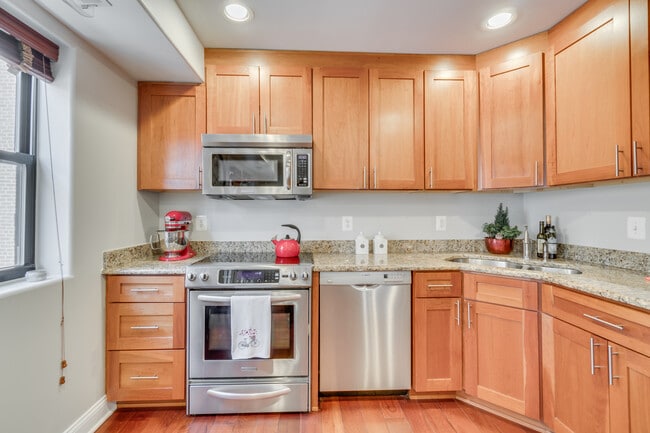 Ample counter space with granite-top counters - 1354 Euclid St NW Unit 402B