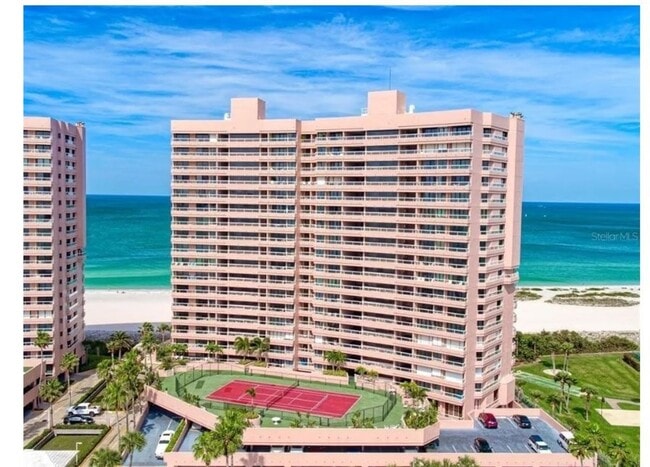 Building Photo - Newly Renovated Beachfront Condo with Stun...