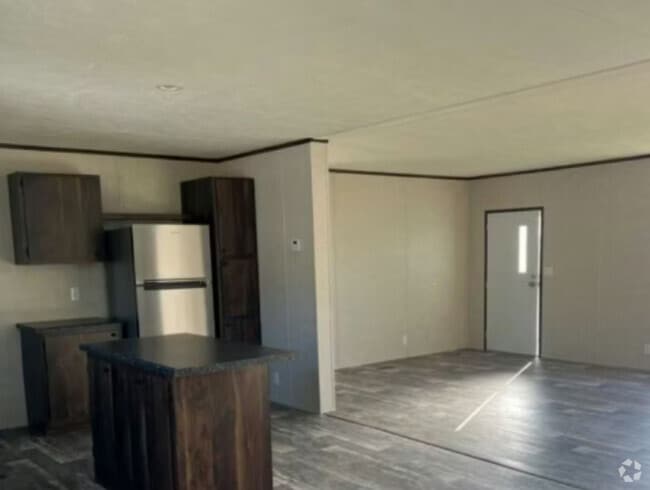 Building Photo - Golden Pebble Estates Rental
