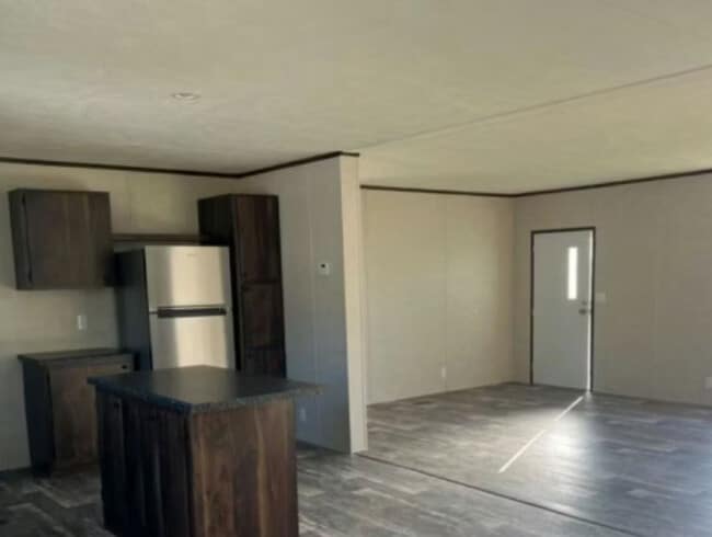 Building Photo - Golden Pebble Estates Rental
