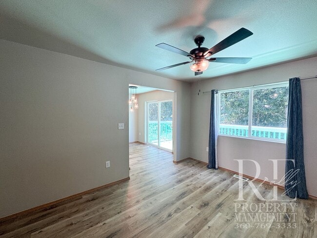 Photo - Pet-Friendly 3-Bedroom Home with Fresh LVP, Stylish Updates & Attached Garage