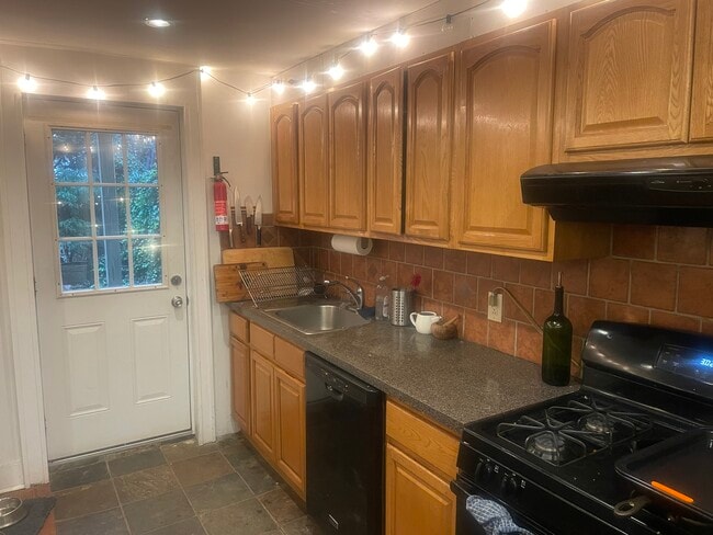 Kitchen area leads out to garden. - 391 8th St Unit Garden apartment
