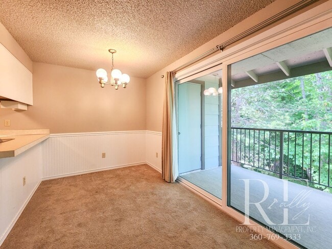 Photo - 50% OFF 1st Month's Rent! Upstairs Condo at The Narrows – Pool, Clubhouse & Woodland Views! Unit 204