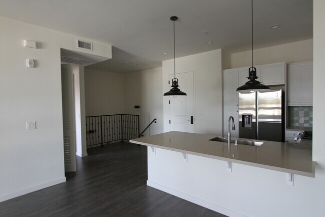Kitchen & Stairway to First Floor - The Residence at Mission View