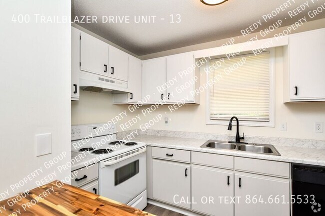 Building Photo - Townhome style apartment across from Trail... Unit 13