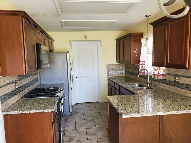 Photo - 3 Bedroom, 2 Bath with large fenced in bac...