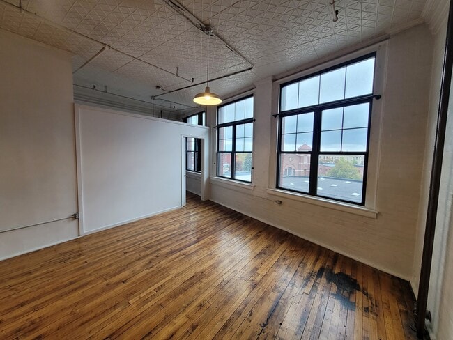 Sala de estar_alt - The Lofts at Searle