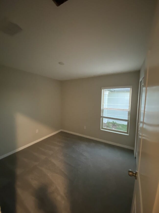 Photo - "Spacious 4-Bed, 2-Bath Gem with 1936 Sq Ft of Comfort in Riverview, FL!"