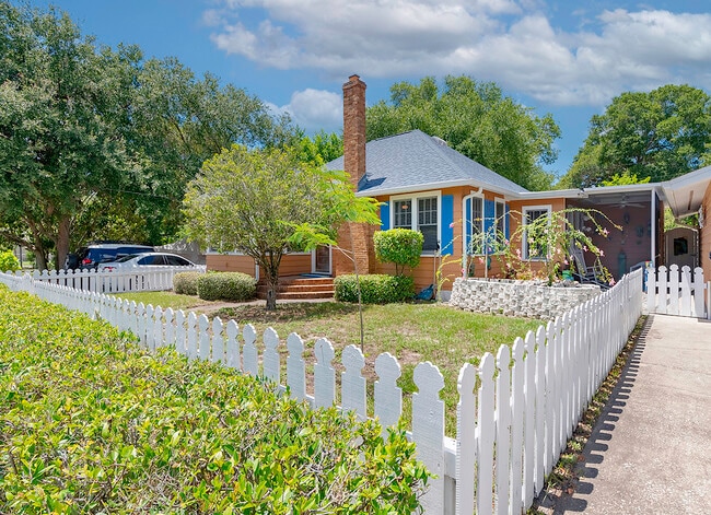 Front w Porch & Pond Entrance