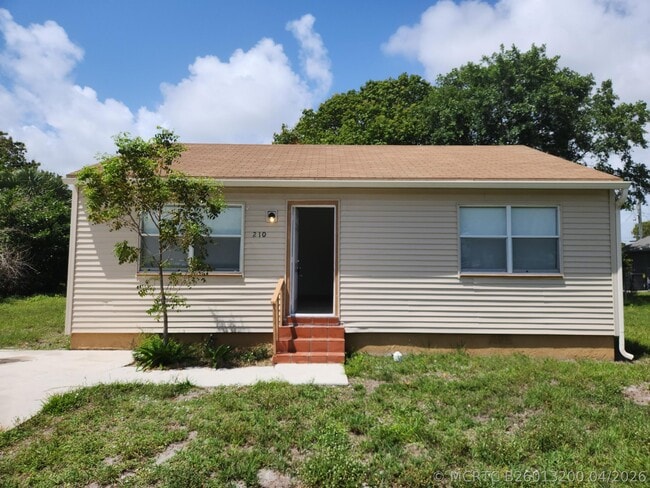 Building Photo - 210 NW 13th Ave