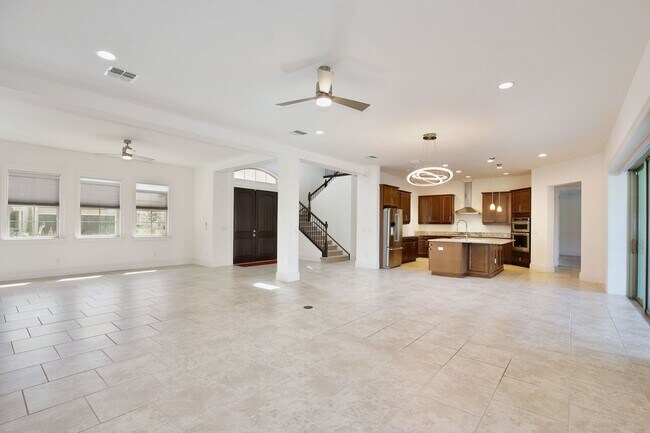 Photo - Stunning 4/5 Executive Pool Home in the Guard-Gated Golf Course Community of Eagle Creek - Orlando!