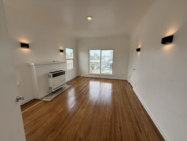 Photo - 212 1/2 W 57th St Unit 212 upper
