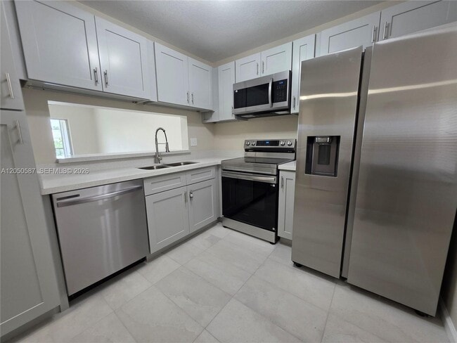 Building Photo - 3790 N University Dr Unit H-1