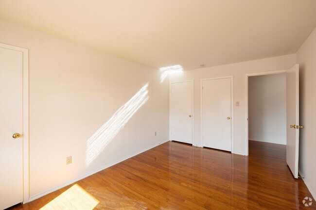 2BR, 1BA - 1200SF - Primary Bedroom - Latham Village Aptartments