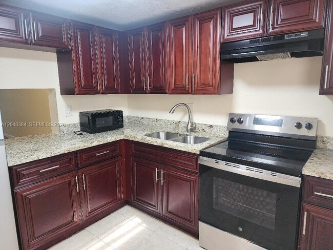 Photo - 1700 NW 58th Terrace Unit 2E