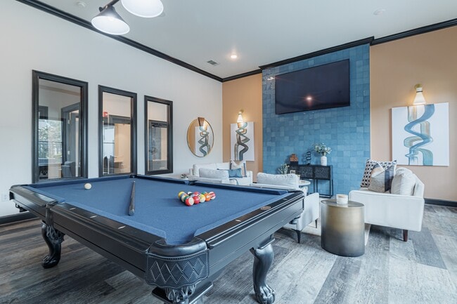Clubhouse with billiard table and television, perfect for social gatherings