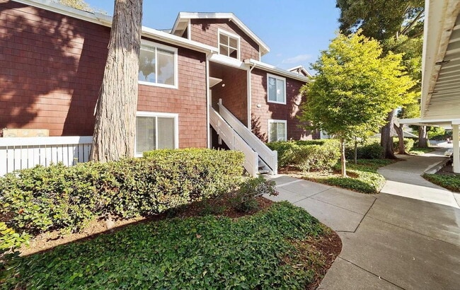 Building Photo - 1 bedroom plus loft features a functional floorplan with high ceilings