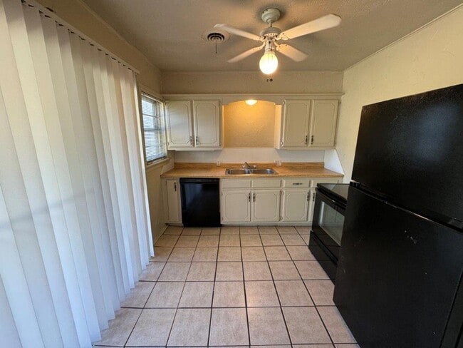 Photo - Mowing Included!  Lots of character, wood vinyl flooring and carpet, large, fenced yard, ready fo...