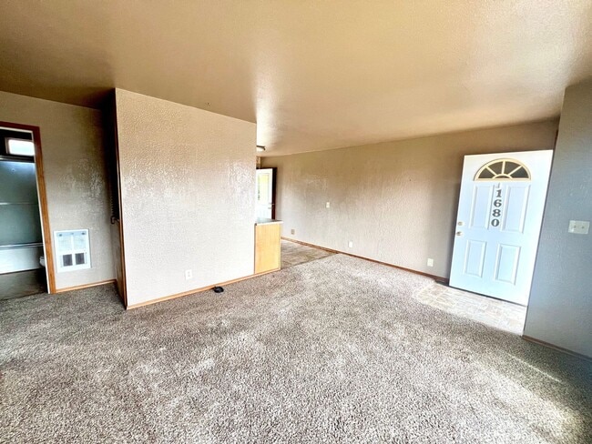 Photo - Cozy 2 Bedroom Home with Backyard & Garage