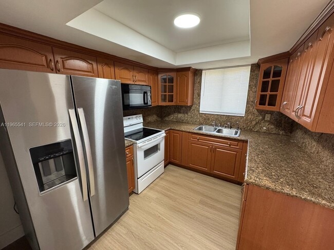 Photo - 7520 W 15th Ct