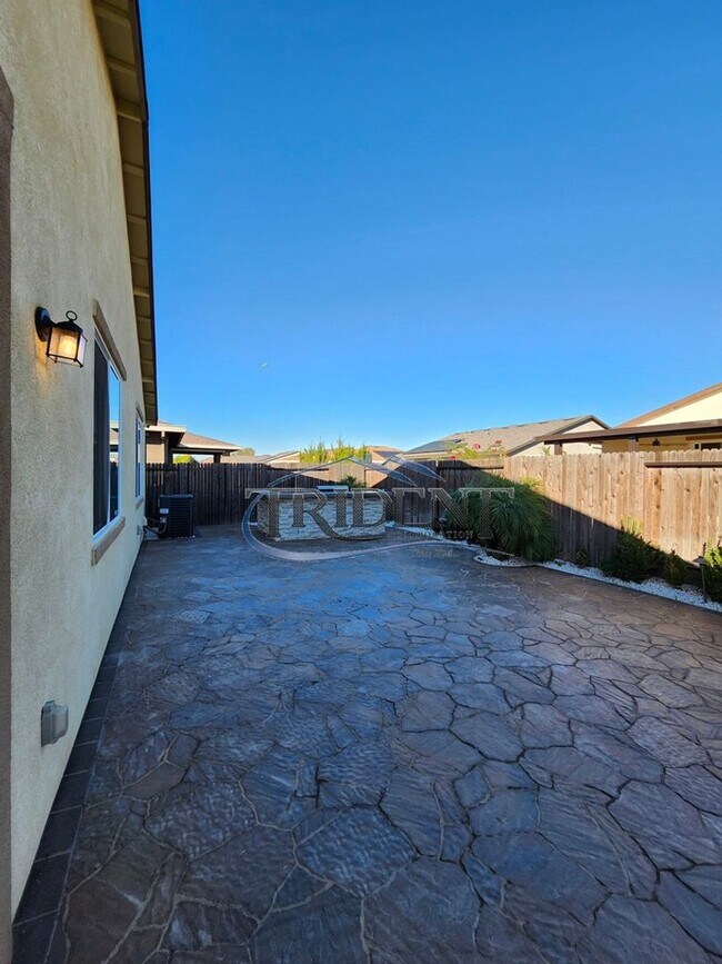 Photo - Updated home with a built in BBQ and play area