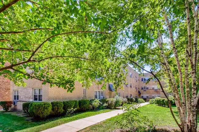 Building Photo - 1709 W Estes Ave Unit 2S