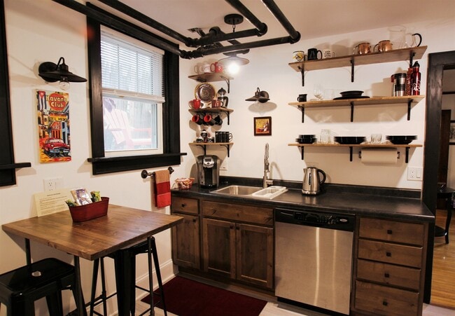 Kitchen with open concept upper cabinets - 2108 E Washington Ave