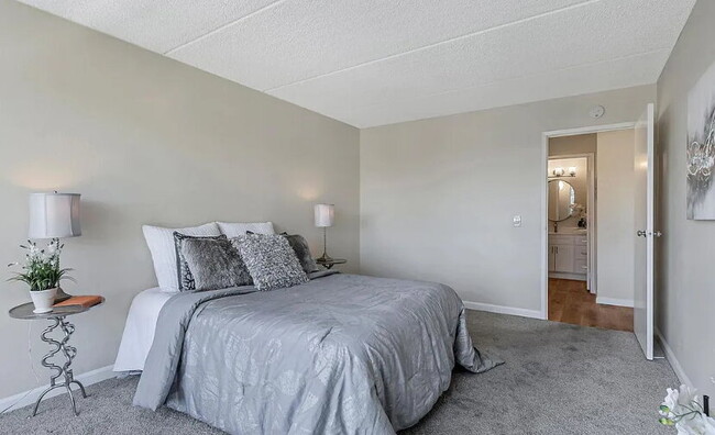 Photo - Spacious 1bdrm living room and bedroom with large picture windows bringing in lots of natural light.