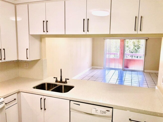 Building Photo - 7830 Camino Real Unit K310