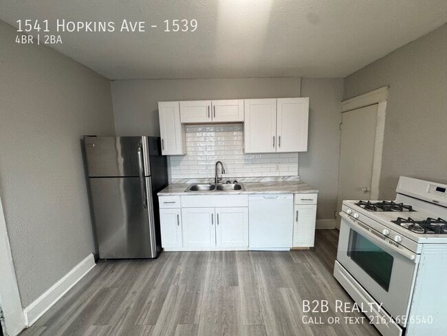 Building Photo - 1541 Hopkins Ave Unit 1539