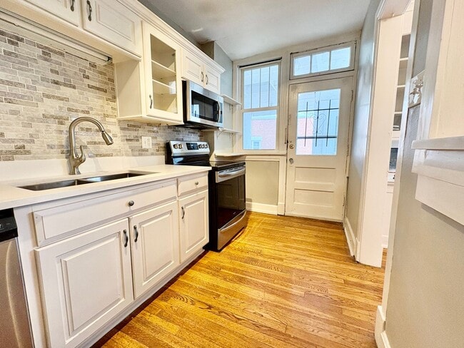 Photo - Top-Floor 2 Bedroom Condo in Gated Community with Huge Balcony & Elegant Marble Bath