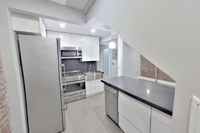 Photo - 411 E 12th St Apartment Unit 1