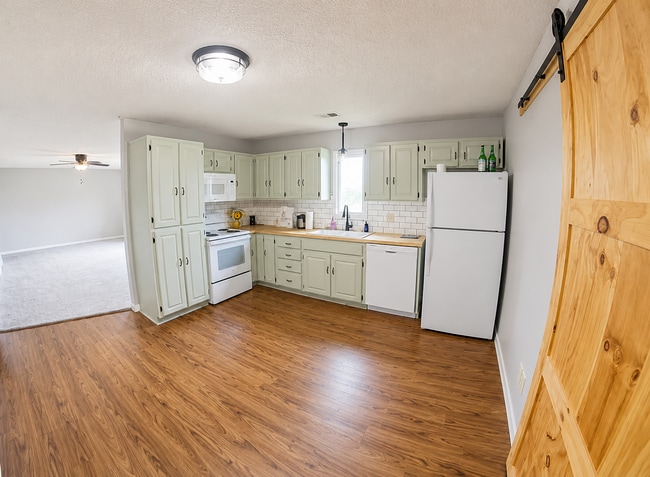 Photo - Pet Friendly + Washer & Dryer Included + Attached Garage! - Available June 19th!