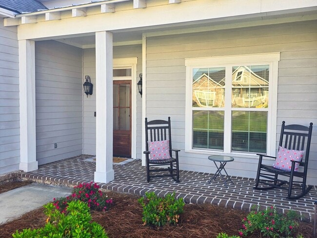 Photo - Spacious 4BR/3BA Home with Open Floor Plan, Screened Porch & Fenced Backyard