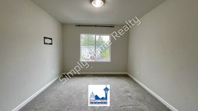 Photo - Step Inside to this Home with Spacious & Flexible Living!