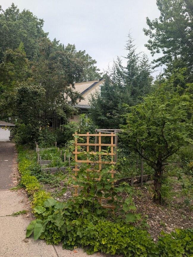 Photo - Charming Garden Oasis in West St. Paul – Fire Pit, Pond & Prime Location!