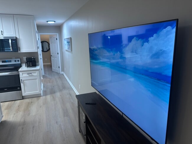 Large Screen TV for the BIG game! - 603 Wagon Wheel Rd Unit Seaside Peace