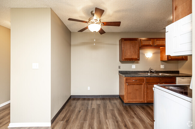 2BR, 1BA - 675 SF - Dining Room - Adventureland Village Apartments