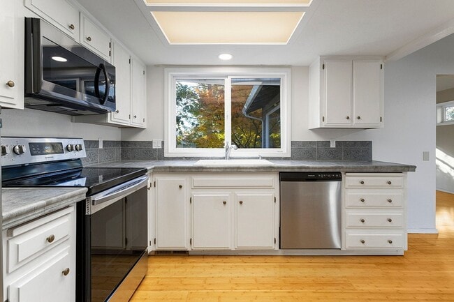 Photo - Spacious Home ! Huge living room, 2nd family room, kitchen nook and extra room off kitchen. Large...