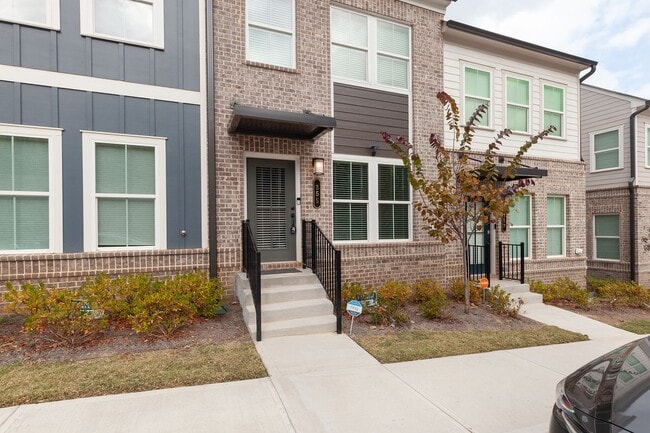 Building Photo - Recently Built 3/3.5 Townhome w/ City Views and Two Car Garage