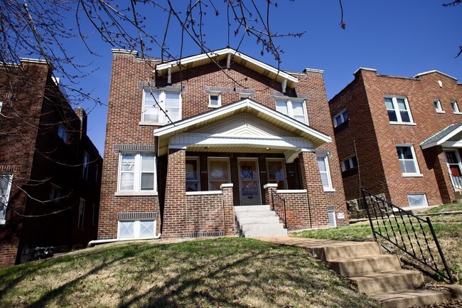 Building Photo - 3927 Dunnica Ave Unit 1F