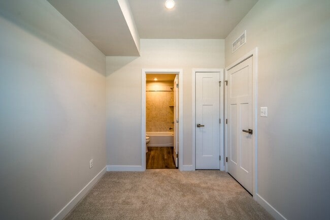 Photo - This 3-bedroom, 3-full bathroom townhouse offers a pristine and contemporary living experience.