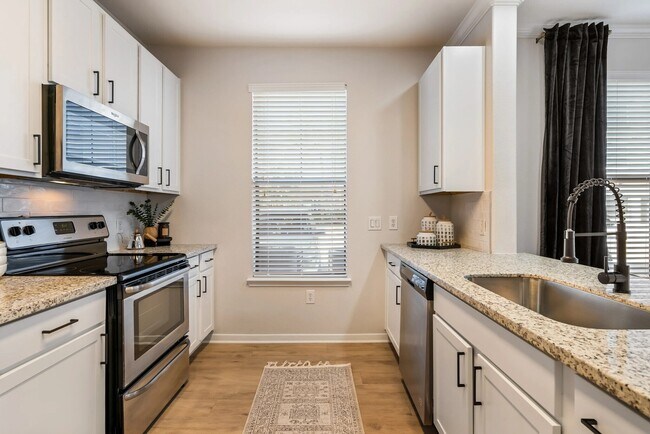 Building Photo - Spin to Win | Rent-Free Move-In Offer! Unit EASR Rental