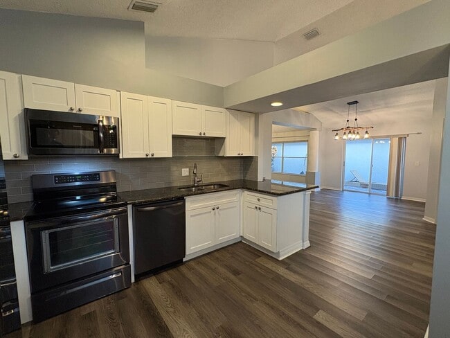 Building Photo - 3/2 with 2 car garage in great location