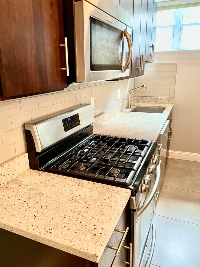 Stainless steel appliances and gas stovetop - 2339 40th Pl NW Unit 4